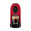 A red Tchibo coffee machine with a glass of espresso. Produktbild-Vorschau