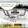 A garden furniture set with a table and four chairs on a tiled patio, with a background of trees and sky. The image also includes seasonal imagery at the bottom. Produktbild-Vorschau