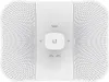 A white wireless bridge device with a perforated design on the sides and a central square unit with a logo. Náhľad obrázku produktu