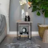 A bedside table with decorative items next to a bed and a plant. Produktbild-Vorschau