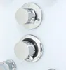 Close-up of two chrome shower controls on a white surface. Náhľad obrázku produktu