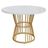 A round dining table with a marble-effect top and a gold metal base. Anteprima dell’immagine prodotto