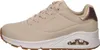 A side view of a single beige sneaker with a white sole and brown outsole. Anteprima dell’immagine prodotto