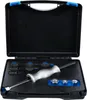 A black toolbox with a sliding hammer and adapters inside. Voir les images du produit