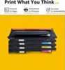 A stack of four toner cartridges with different colored labels, set against a bright yellow background. Produktbild-Vorschau