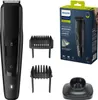 A Philips S5000 beard trimmer and its accessories are displayed on a white background, along with its packaging. Produktbild-Vorschau
