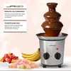 A chocolate fountain with accompanying fruits and marshmallows, with descriptive text panels. Podgląd zdjęcia produktu