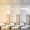 A collage showing a modern LED ceiling light with multiple rings in different color temperatures (3000K, 4000K, 6500K) and a bedroom setting illuminated by the light. Voir les images du produit