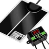 A heating mat with a digital thermostat for terrariums. Voir les images du produit