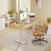 A modern home office setup with a standing desk, computer, and chair. Produktbild-Vorschau