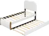 A white upholstered bed frame with a pull-out trundle bed, shown from a diagonal angle against a white background. Náhled obrázku produktu