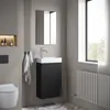 A modern bathroom with a wall-mounted vanity and sink. Anteprima dell’immagine prodotto
