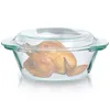 A roasted chicken in a glass baking dish. Podgląd zdjęcia produktu