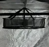 A black mesh drying net hangs from a metal bar inside a grow tent. Produktbild-Vorschau