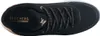 A top-down view of a black Skechers sneaker with gold accents and white laces. Voir les images du produit