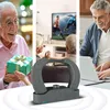 A collage of three scenes showing seniors enjoying technology and gifts, with a product in the foreground. Produktbild-Vorschau