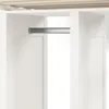 A close-up view of a white closet rod inside a white closet. Produktbild-Vorschau