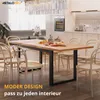 A dining room with a table and chairs, set for a meal. Podgląd zdjęcia produktu