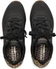 A top-down view of a pair of black Skechers sneakers with leopard print insoles. Voir les images du produit