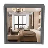 A bedroom interior viewed through a closet door. Voir les images du produit