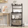 A black metal shelving unit with a printer and books on it, next to a wooden desk with artwork. Anteprima dell’immagine prodotto