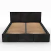 A black upholstered bed frame with a slatted base, shown from the front on a white background. Podgląd zdjęcia produktu