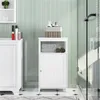 A white bathroom cabinet with a door and an open shelf above, filled with towels and decorative items, stands against a light green tiled wall. Produktbild-Vorschau