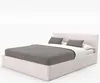 A bed with a headboard, mattress, and pillows, presented on a white background. Náhled obrázku produktu