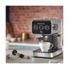A Russell Hobbs espresso machine is shown in a kitchen setting, with a cup of coffee being brewed. Produktbild-Vorschau