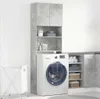 A laundry room scene with a washing machine and storage cabinets. Náhled obrázku produktu