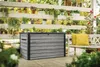 An outdoor patio scene with a storage box, bench, and plants. Produktbild-Vorschau