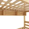 Close-up view of the wooden slatted base and side support of a bunk bed. Náhled obrázku produktu