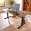 A modern office desk setup with a computer, keyboard, mouse, and a leather bag hanging from the side. Náhled obrázku produktu