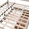 Close-up view of the wooden slats and support structure of a bed frame. Produktbild-Vorschau