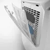 Close-up view of the internal filters of a white air purifier, with the front panel open. Voir les images du produit