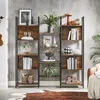 A multi-shelf bookshelf filled with decorative items and books, set against a textured gray wall. Produktbild-Vorschau