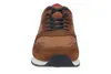A front view of a brown sneaker against a white background. Produktbild-Vorschau