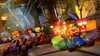 Characters from Crash Team Racing Nitro-Fueled racing karts on a jungle-themed track. Podgląd zdjęcia produktu