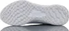 The underside of a white Nike shoe is shown against a white background. Voir les images du produit