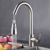 A kitchen faucet with water running into a sink. Produktbild-Vorschau
