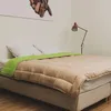 A bedroom scene with a bed. Produktbild-Vorschau