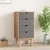 A tall, narrow chest of drawers with four gray drawers and a wooden frame, standing on four wooden legs. It is placed against a white wall, with a potted plant to its right and a basket with a camera to its left. Voir les images du produit