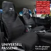 Interior of a car with black seat covers on the front seats. Produktbild-Vorschau