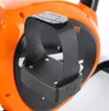 Close-up of a pedal with a strap on an orange exercise bike. Náhľad obrázku produktu