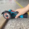 akumulatorowa szlifierka kątowa 72 mm z akumulatorami 2x Podgląd zdjęcia produktu 7