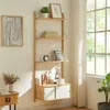 A wooden ladder shelf with storage drawers, decorated with books, a clock, and vases, placed against a wall next to a window. Voir les images du produit
