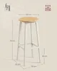 A bar stool with dimensions and weight capacity indicated, along with an illustration of a person using a bar. Náhled obrázku produktu