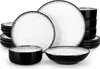 A set of stoneware dishes, including plates and bowls, arranged on a white background. Produktbild-Vorschau