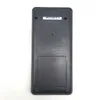 The back of a black calculator is shown against a white background. Voir les images du produit