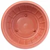 A top-down view of an empty terracotta planter. Produktbild-Vorschau